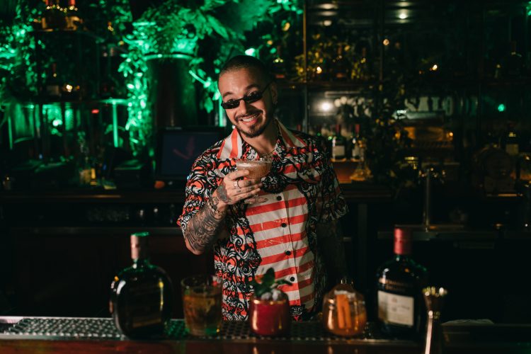 J Balvin Serving Guests Cocktails at Casa Buchanan's The Speakeasy in Las Vegas 4_24_19_Photo by Orli Arias