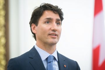 El primer ministro canadiense, que entonces tenía 29 años, es el único con la piel oscurecida.
(Dreamstime)