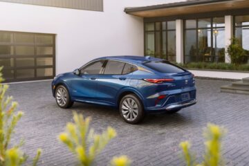 Rear 7/8 view of the 2024 Buick Envista Avenir in Ocean Blue Metallic. Preproduction model shown. Actual production model may vary. Available in summer 2023.