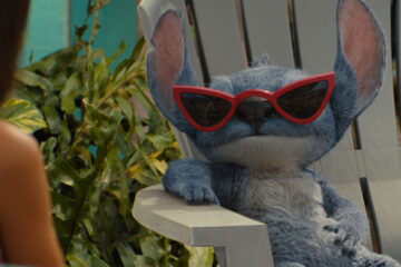 (L-R) Maia Kealoha as Lilo and Stitch in Disney’s live-action LILO & STITCH. Photo courtesy of Disney. © 2025 Disney Enterprises Inc. All Rights Reserved.